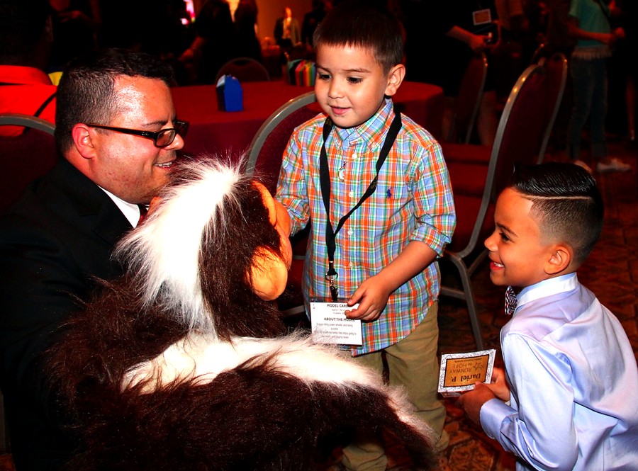 Jimmy Vee performing for children at a Runway For Hope event