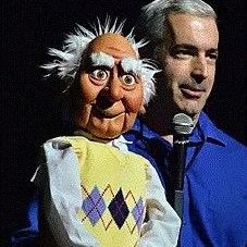 Mike Palma with his figure Buddy