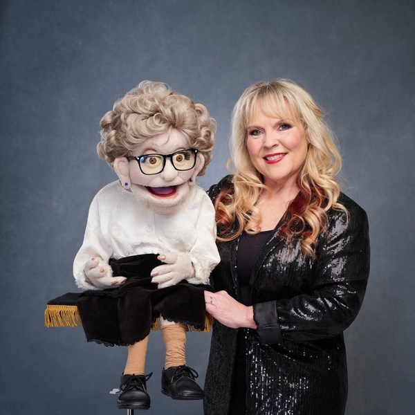 Trish Dunn with one of her figures